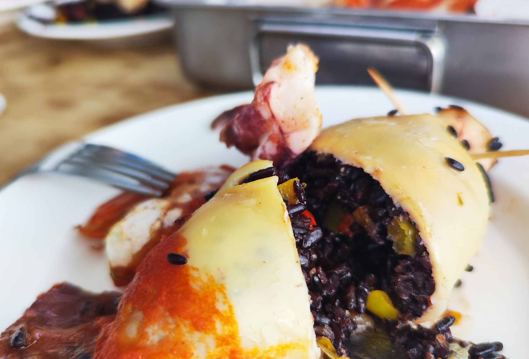 Stuffed calamari with black squid-ink risotto
